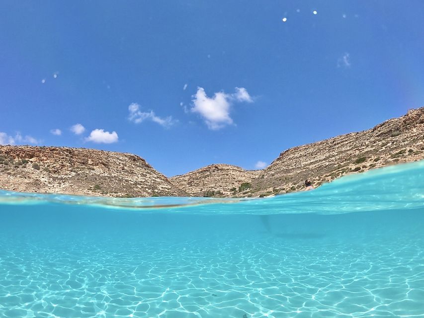 5 hours Lampedusa: Boat Tour with panino SUP e snorkeling - Pane cunzato and a glass of local wine