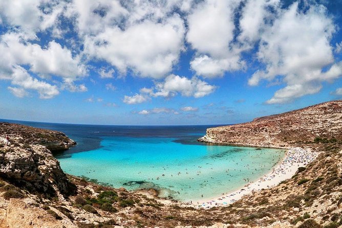 7 hours Boat trip to Lampedusa lunch, SUP and Snorkeling - The beach near the islet and marine reserve limits