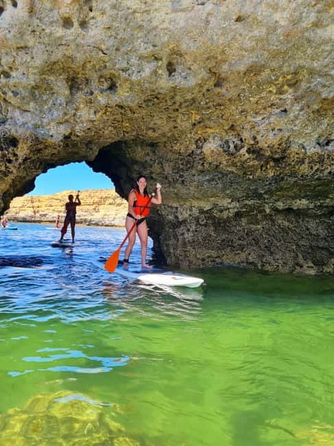 Albufeira: Caves and Beaches SUP Paddleboarding Tour - The small beach stop after the caves