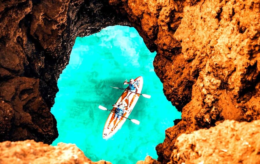 Albufeira: Hidden Beaches & Cliffs Guided Kayak Cave Tour - The first cliffs: Praia da Coelha and Praia do Ninho das Andorinhas