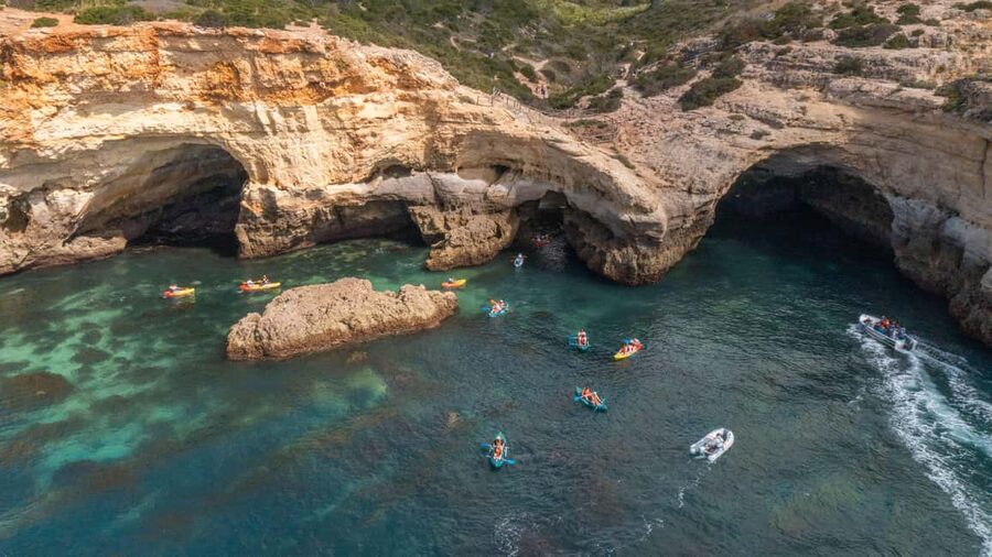 Albufeira Marina: Benagil Cave to Marinha Beach Kayak Tour - Swimming stops depend on calm water