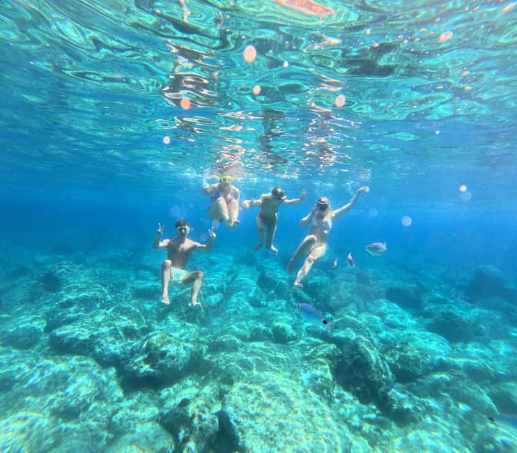Alghero: boat tour, snorkelling, sup - What $82 buys you in practical terms