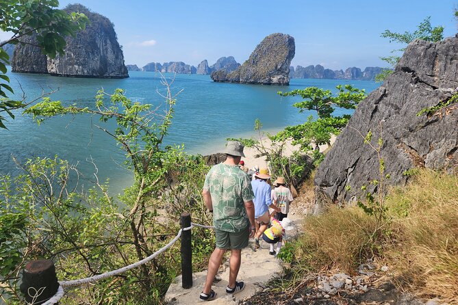 All-Inclusive 3 Day/2 Night Halong Luxury Cruise Meals, Cave, Kayaking, Swimming - Day one: Hanoi transfer, bay views, and classic caves