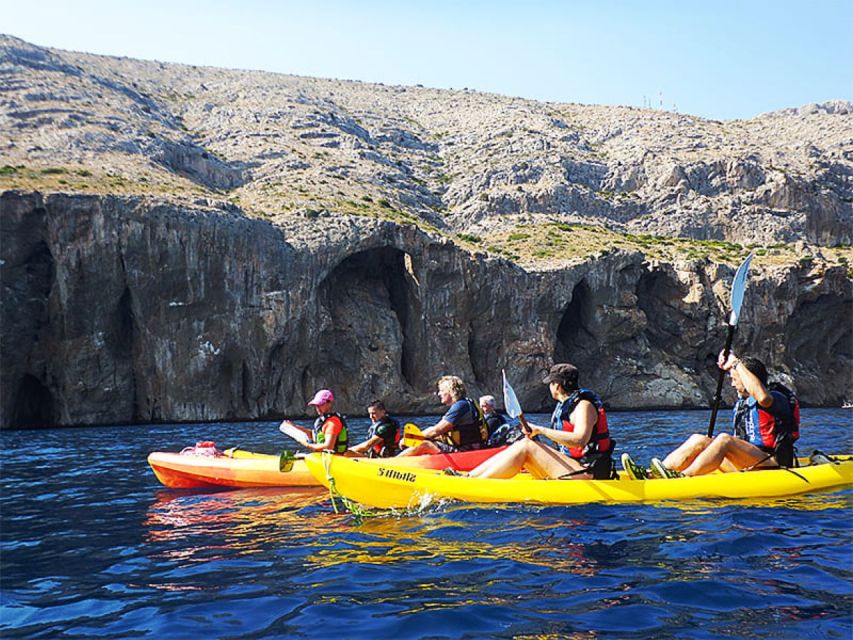 Altea: Morro de Toix Guided Kayak Excursion - Entering Cueva dels Coloms from the water