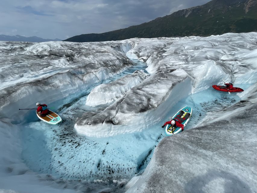 Anchorage: Knik Glacier Helicopter and Paddleboarding Tour - Paddleboarding through remote glacier pools