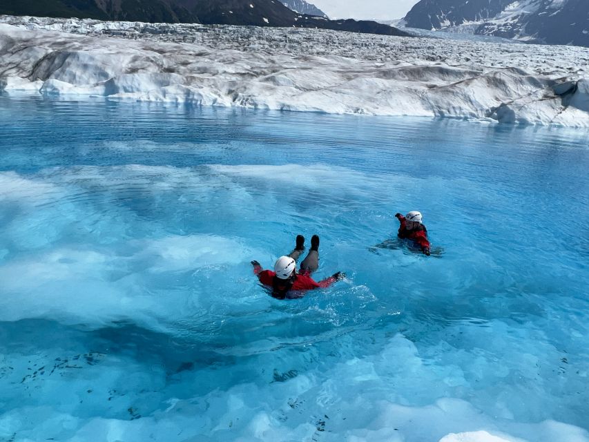 Anchorage: Knik Glacier Helicopter and Paddleboarding Tour - What the guides add to a high-risk-feeling outing