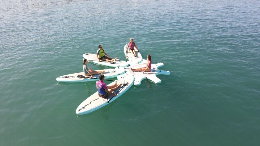 Arguineguín: Stand-up Paddleboard Yoga Class with Instructor - Yoga poses with water beneath you