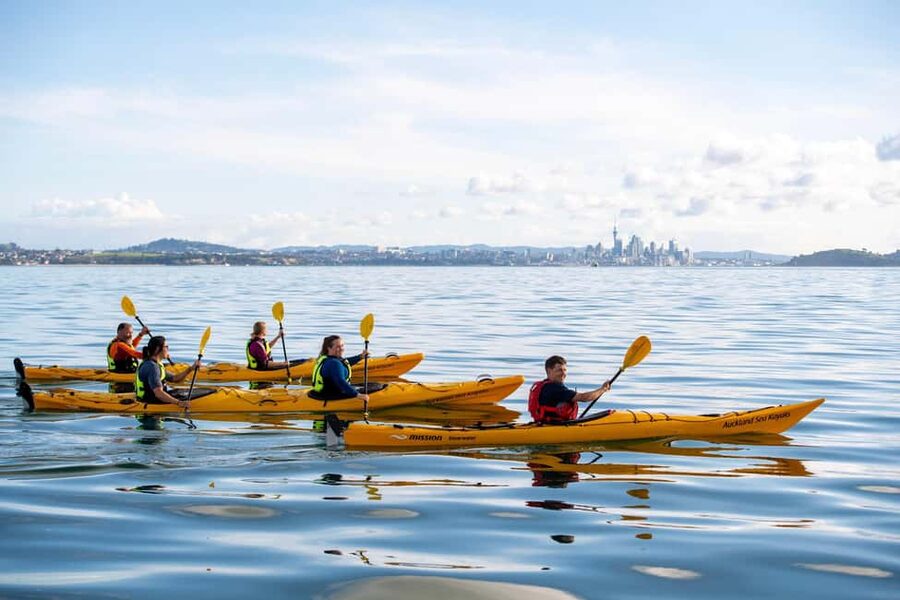 Auckland: Sunset & Night Sea Kayak Tour to Rangitoto Island - Sunset over the Waitakere Ranges