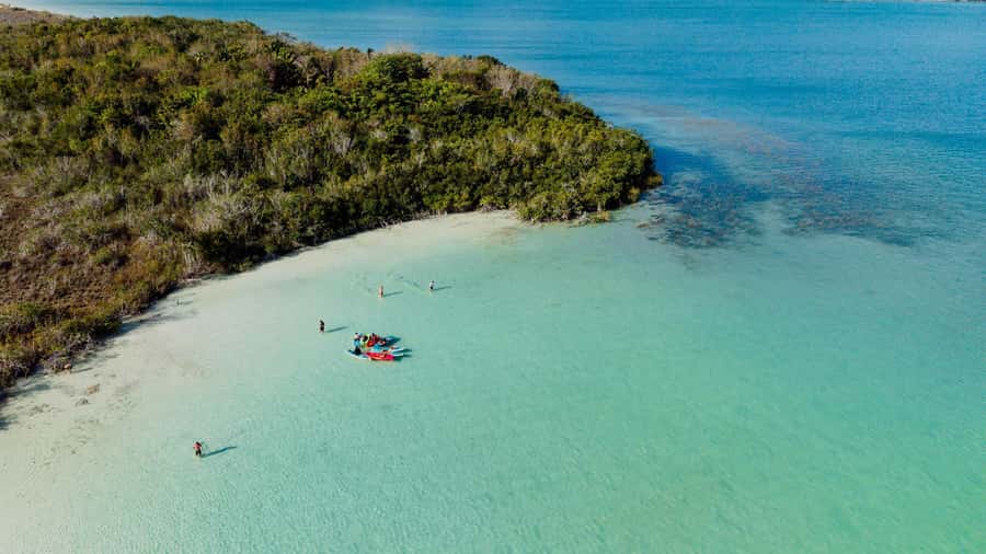 Bacalar at Sunrise: Kayak Adventure with Breakfast & Photos - Paddling through the lagoon at sunrise