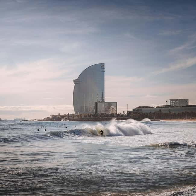 Barcelona: Sunrise or Sunset Paddle Surf with Photos - Who should book this experience?
