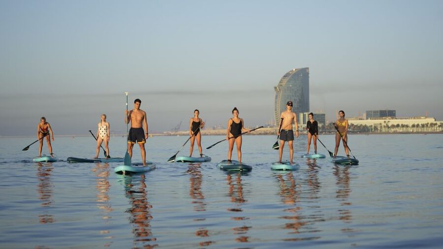 Barcelona: Sunrise Paddleboarding with Instructor and Photos - The three-minute walk to Barceloneta Beach