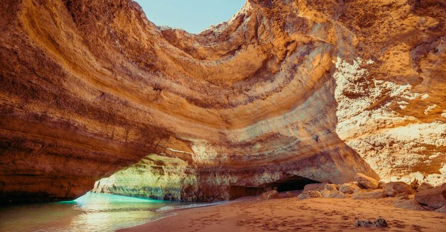 Benagil: Caves, Coves & Secret Beaches Guided Kayaking Tour - Starting at Benagil Beach with a safety briefing