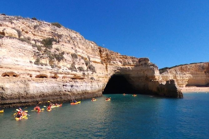 Benagil Kayak Tour On Board a Fantastic Catamaran - Getting into the kayaks from the rear ramp