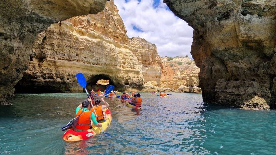 Benagil: Sunrise kayak tour Benagil caves and secret spots - Paddling along the Algarve cliffs