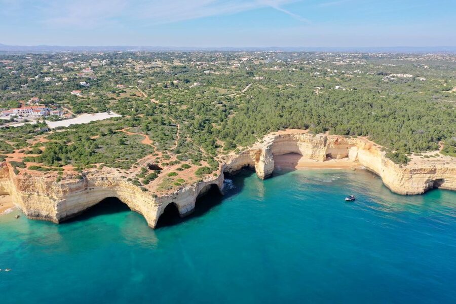 Benagil: Sunrise kayak tour Benagil caves and secret spots - Praia da Marinha gives the trip a second coastal highlight
