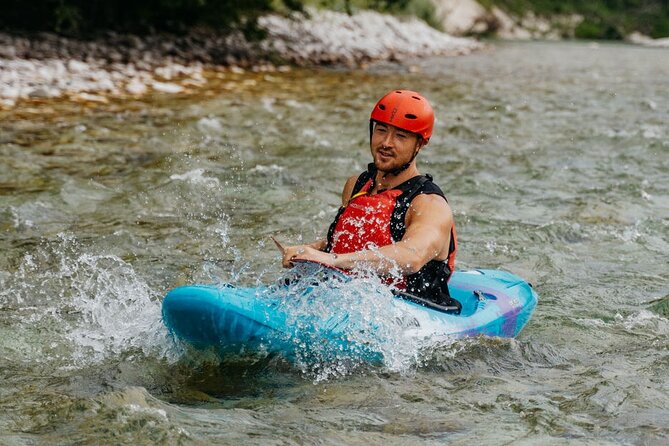 Best Guided Kayaking Tour in Soča Valley With Photos - Games, swimming, and pauses beside the river