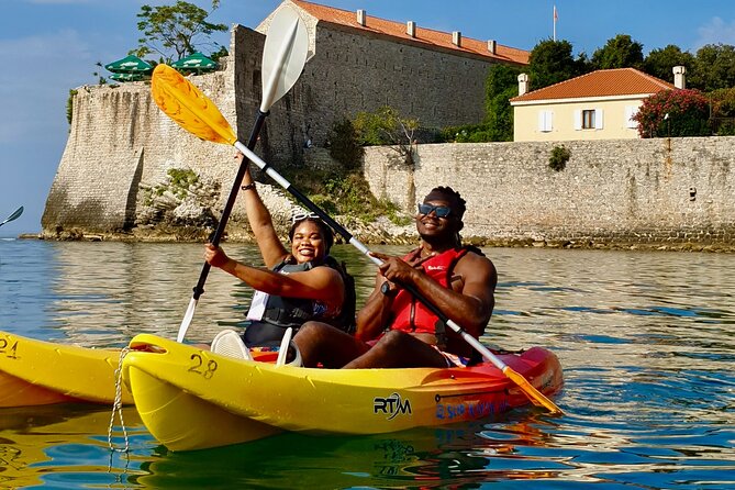 Budva Bay: Kayak & SUP Tour to Coastal Caves - Starting at Slovenska Plaza with a simple paddle lesson