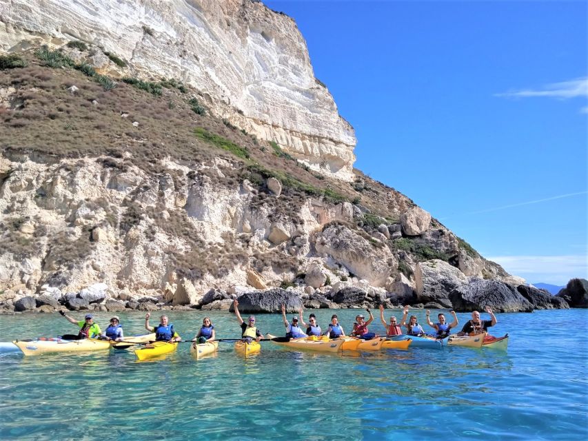 Cagliari: Guided Kayak Excursion in the Gulf of Cagliari - What the guide adds to the experience