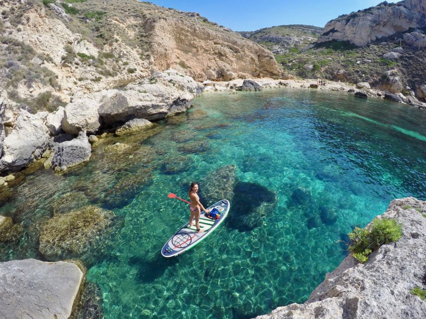 Cagliari: Stand Up Paddleboarding (SUP) Tour & Snorkeling - Paddling beside cliffs and sea stacks