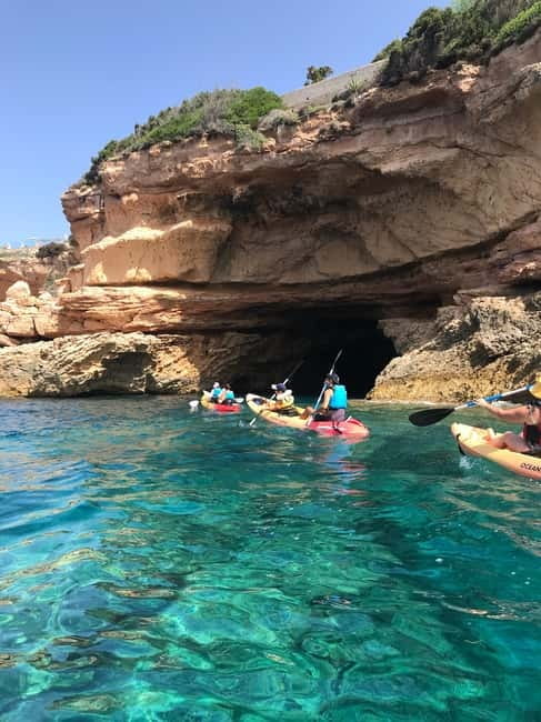 Cala Codolar: Sea & Caves Kayaking Tour with Snorkeling - Launching from Cala Codolar’s pebbly shore
