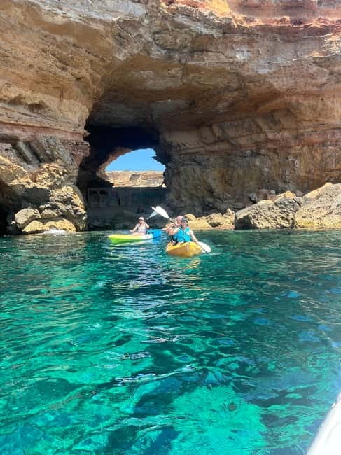 Cala Codolar: Sea & Caves Kayaking Tour with Snorkeling - Paddling past cliffs, coves, and cave entrances