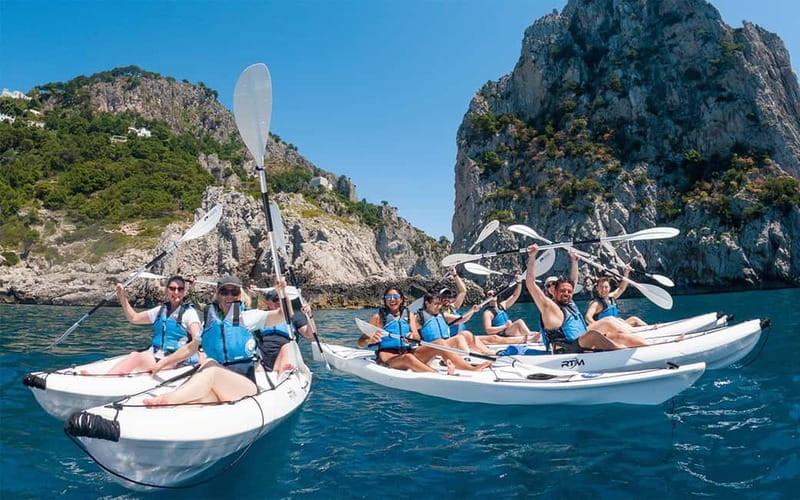 Capri: Caves and Beaches Kayaking Tour with GoPro Photos - The Arch of the Star and Faraglioni rocks