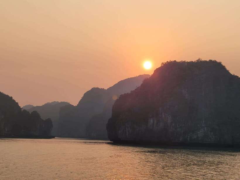 Cat Ba: Day boat tour with: kayak, cave, bike, meal, tickets - Viet Hai village, local life, and the fish massage