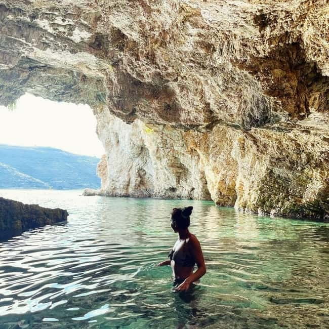 Caves of Porto Palermo: Kayak/SUP Tour with Castle Sea View - Across the bay, where cliffs frame the route
