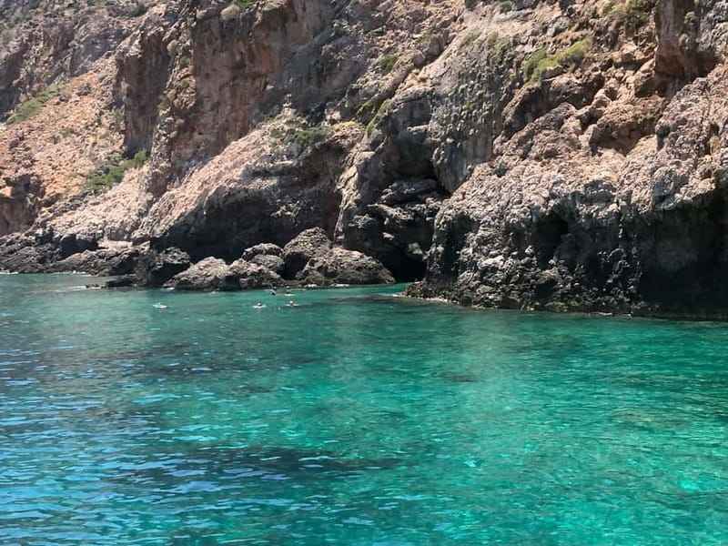 Chania: Private Cruise with Sup Food & Unlimited Drinks - Secluded coves, dolphins, and open-water sailing