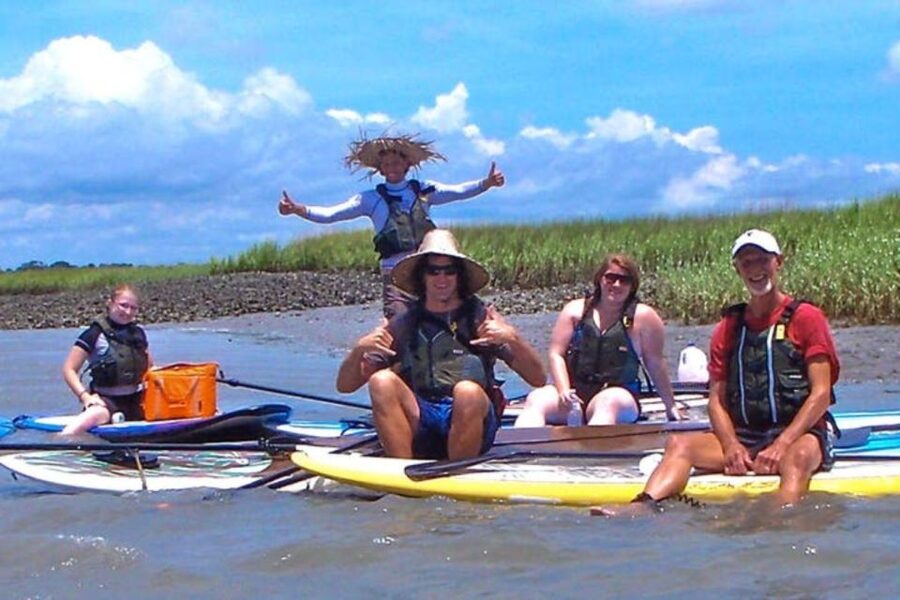Charleston: Folly Beach Stand Up Paddleboard Dolphin Safari - Learning to stand on the board before chasing dolphins