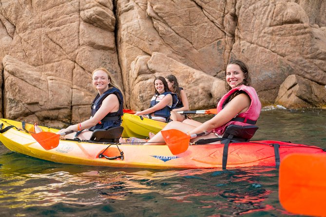 Costa Brava Kayak & Snorkel Tour + Picnic from Barcelona - Tandem kayaking along the rocky coast