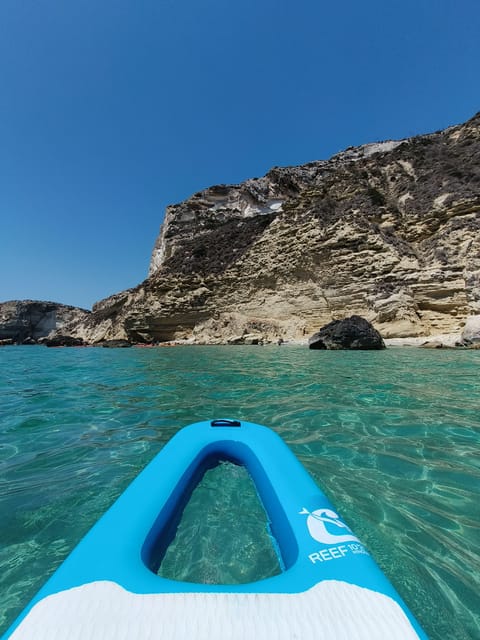 Crabonaxa: Stand up paddle SELLA Diavolo Poetto Calamosca - The Piscine di Gianfranco and the coast beyond
