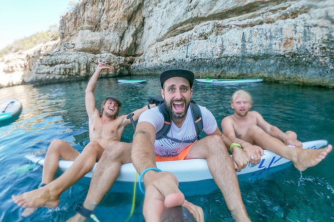 Discover the best corners of the island in paddle surf - Swimming and optional cliff jumps