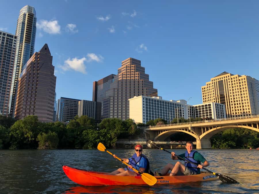Downtown Sunset Tandem Kayak with 1.5M Bats - The bat flight beneath the bridge
