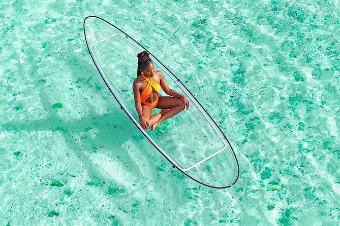 Drone Clear Kayak Barbados Photoshoot Experience - Getting comfortable in the clear kayak
