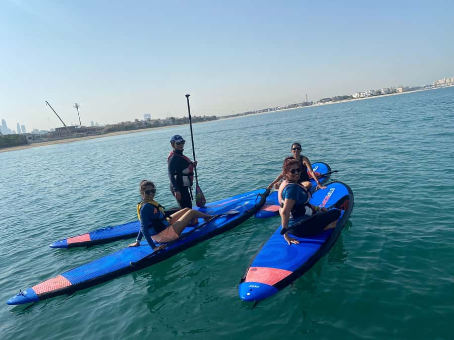 Dubai: Palm Jumeirah Paddle Boarding Tour - A quick swim in warm Dubai water