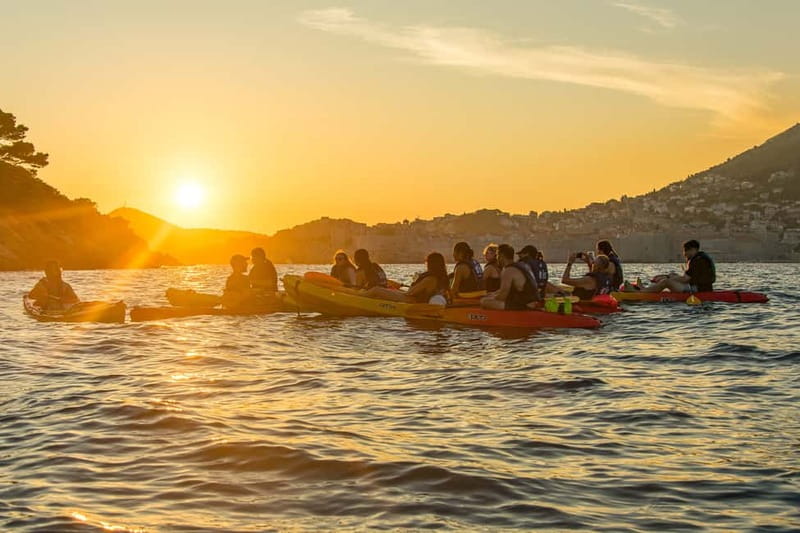 Dubrovnik: Guided Sunset Sea Kayaking Tour with Wine - The return beside the coast