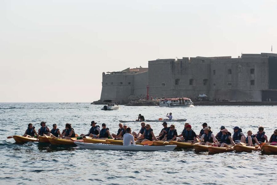 Dubrovnik: Sunset Sea Kayaking Tour - Wine, water, equipment, and the $47 price