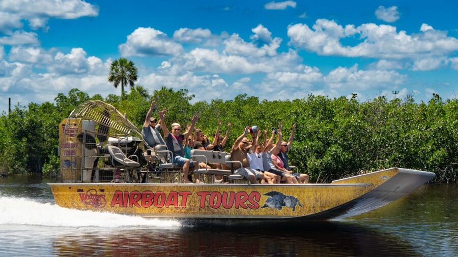 Everglades City: Guided Kayaking Tour and Airboat Ride - Paddling through mangrove tunnels and cypress country