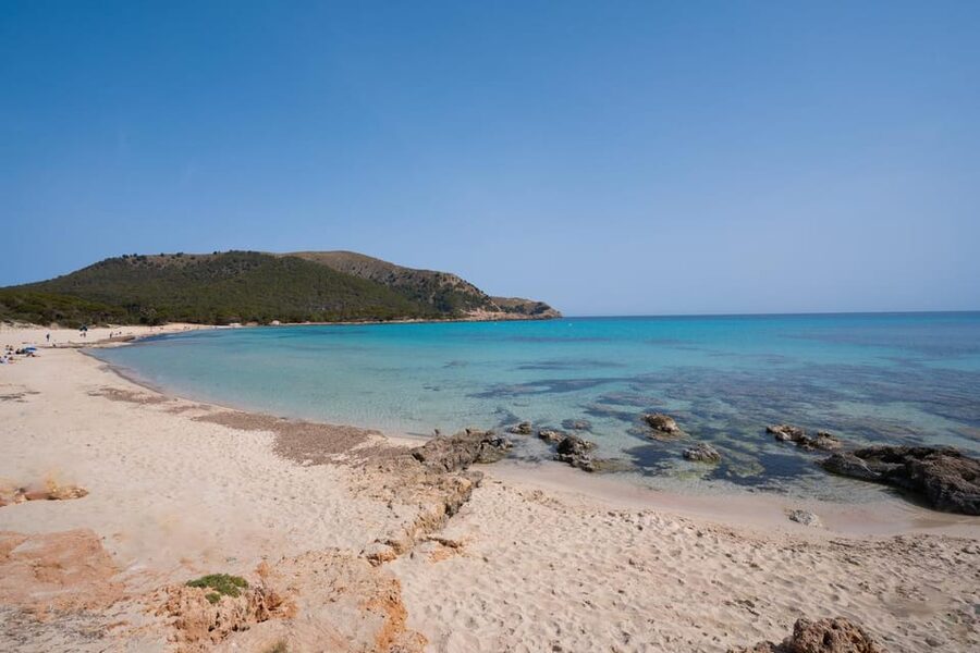 Experinence Cala Agulla / Molto with Paddlesurf and snorkel - The van ride and pickup plan