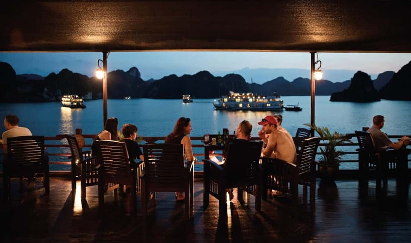 From Hanoi: 2-Day Halong Bay Cruise with Meals and Kayaking - Dinner, karaoke, and squid fishing after dark