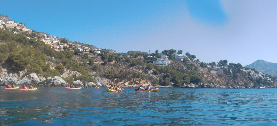 From Málaga: Cliffs of Maro-Cerro Gordo Guided Kayaking Tour - From Málaga to La Herradura by air-conditioned bus
