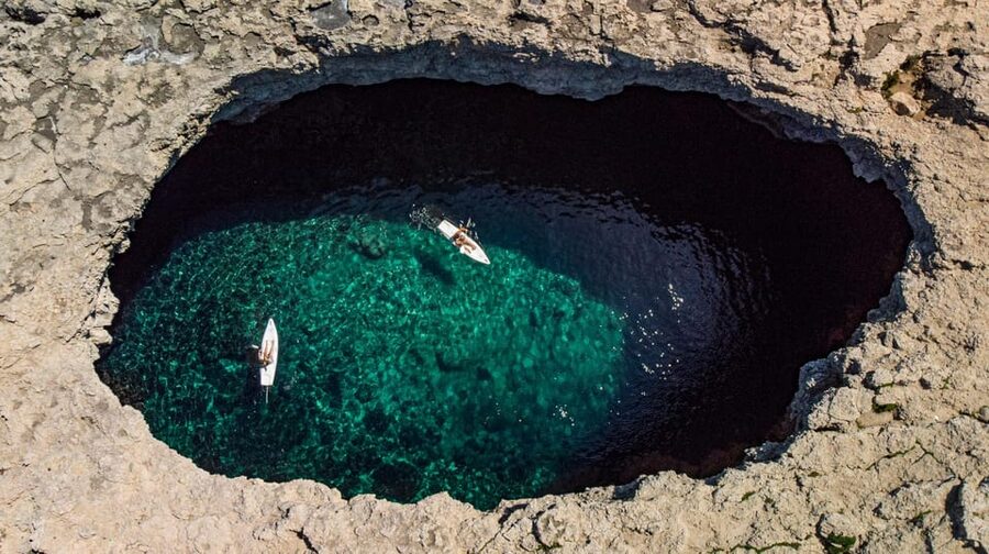 From Mellieħa: Coral Lagoon Kayak Rental - Entering the Coral Lagoon sea cave