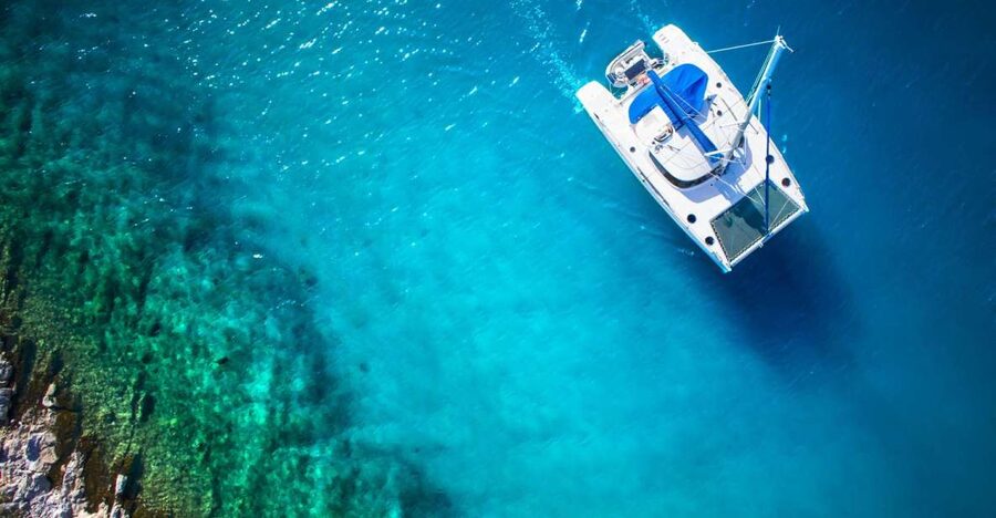 From Ornos: Mykonos Delos Catamaran Cruise with Meal & SUP - Key points at a glance