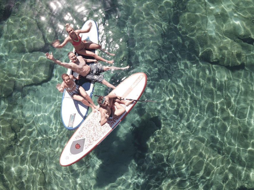 From Ornos: Mykonos Delos Catamaran Cruise with Meal & SUP - Setting out from Ornos for a five-hour Aegean ride