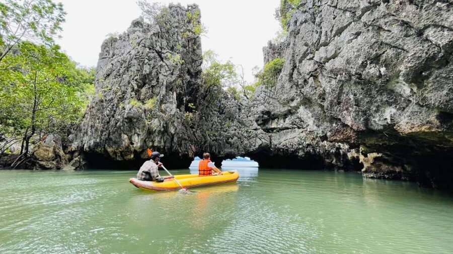 From Phuket: Phang Nga Bay and Canoeing Tour by Big Boat - Staff, photographs, and the human side of the tour