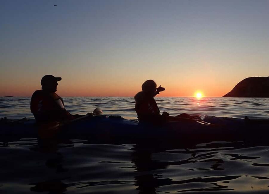 From Tromsø: Sommarøy Midnight Sun Sea Kayaking Tour - White beaches and the shore break