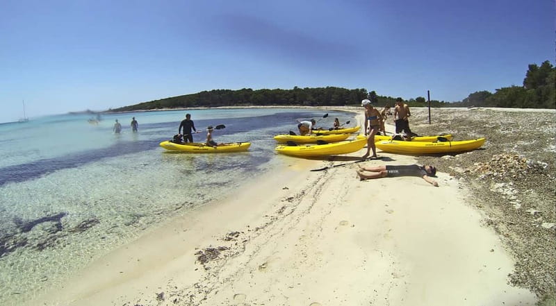 From Zadar: Full-Day Kayaking Tour in Dugi Otok - Paddling along cliffs, coves, and quiet bays