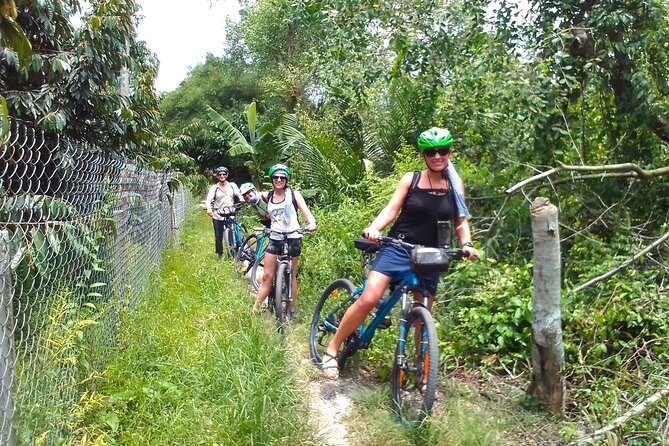 Full Day Off The Beaten Track the Mekong Delta. - Cycling through villages, orchards, and farms