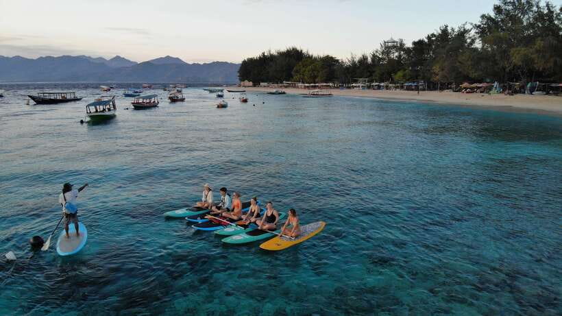 gili sunrise Stand-up paddle boarding or kayaking (droneshot - Who will enjoy this Gili morning most